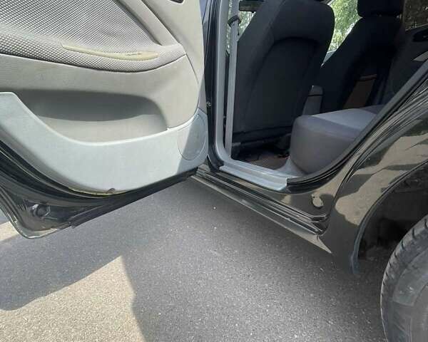 Черный Шевроле Нубира, объемом двигателя 1.6 л и пробегом 225 тыс. км за 5000 $, фото 14 на Automoto.ua