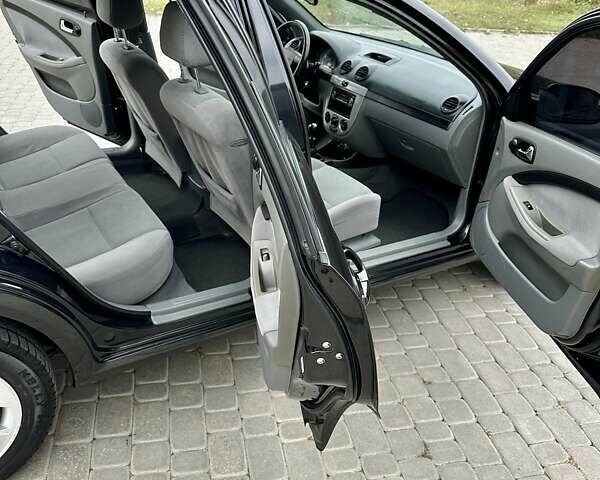 Черный Шевроле Нубира, объемом двигателя 1.6 л и пробегом 175 тыс. км за 5197 $, фото 27 на Automoto.ua