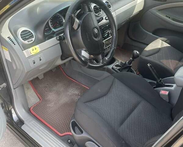 Черный Шевроле Нубира, объемом двигателя 1.6 л и пробегом 225 тыс. км за 5000 $, фото 11 на Automoto.ua