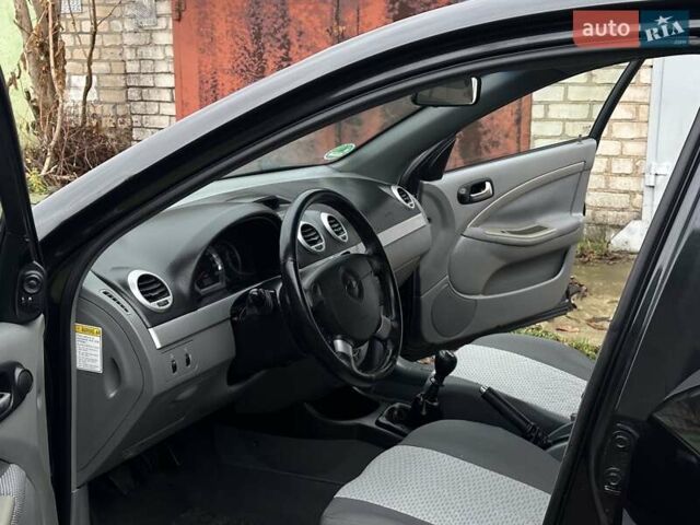 Черный Шевроле Нубира, объемом двигателя 1.6 л и пробегом 205 тыс. км за 5450 $, фото 37 на Automoto.ua