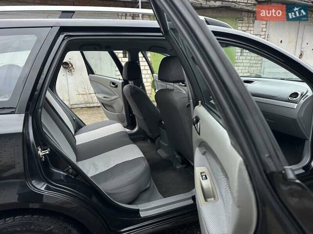 Черный Шевроле Нубира, объемом двигателя 1.6 л и пробегом 205 тыс. км за 5450 $, фото 40 на Automoto.ua