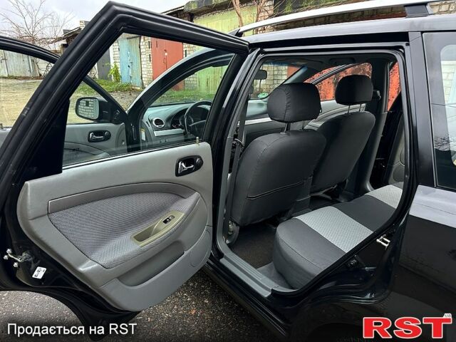 Черный Шевроле Нубира, объемом двигателя 1.6 л и пробегом 205 тыс. км за 5450 $, фото 10 на Automoto.ua