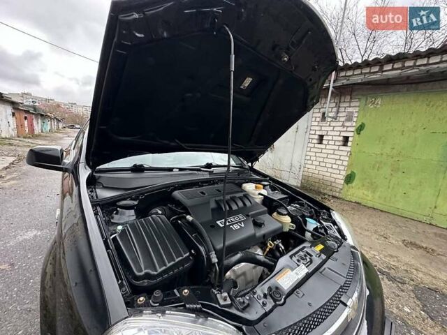 Черный Шевроле Нубира, объемом двигателя 1.6 л и пробегом 205 тыс. км за 5550 $, фото 43 на Automoto.ua