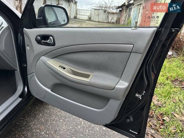 Черный Шевроле Нубира, объемом двигателя 1.6 л и пробегом 205 тыс. км за 5450 $, фото 39 на Automoto.ua