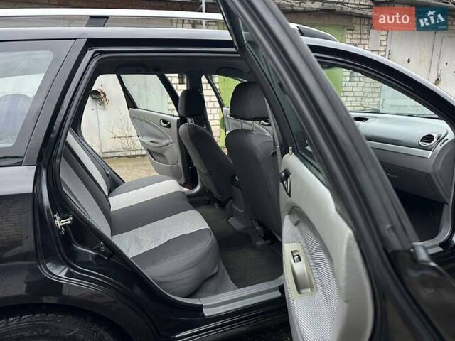 Черный Шевроле Нубира, объемом двигателя 1.6 л и пробегом 205 тыс. км за 5450 $, фото 40 на Automoto.ua