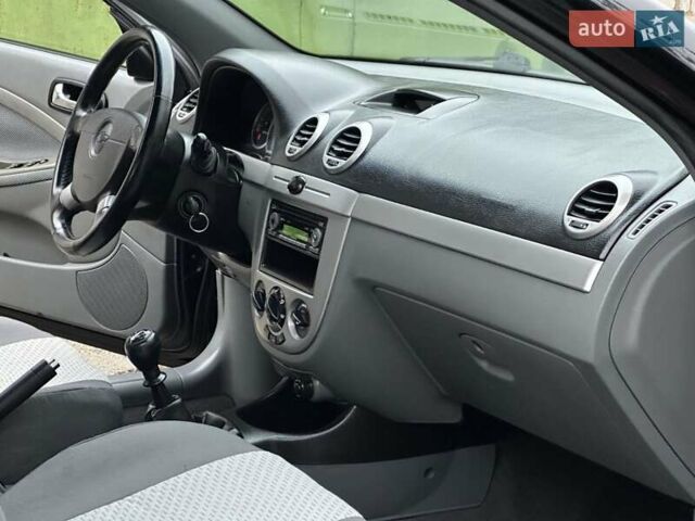 Черный Шевроле Нубира, объемом двигателя 1.6 л и пробегом 205 тыс. км за 5450 $, фото 28 на Automoto.ua