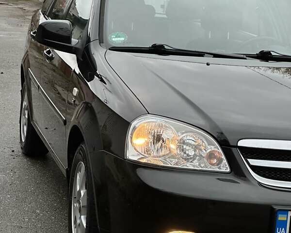 Черный Шевроле Нубира, объемом двигателя 1.6 л и пробегом 205 тыс. км за 5550 $, фото 14 на Automoto.ua