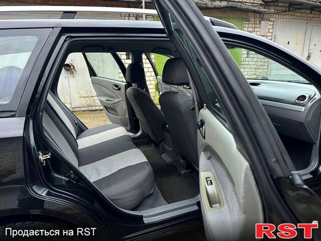 Черный Шевроле Нубира, объемом двигателя 1.6 л и пробегом 205 тыс. км за 5450 $, фото 9 на Automoto.ua