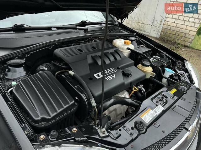 Черный Шевроле Нубира, объемом двигателя 1.6 л и пробегом 205 тыс. км за 5450 $, фото 44 на Automoto.ua