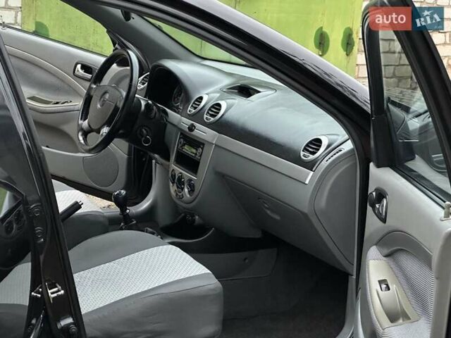 Черный Шевроле Нубира, объемом двигателя 1.6 л и пробегом 205 тыс. км за 5250 $, фото 33 на Automoto.ua