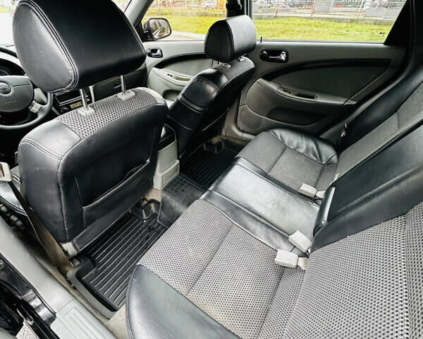 Черный Шевроле Нубира, объемом двигателя 1.6 л и пробегом 252 тыс. км за 4500 $, фото 11 на Automoto.ua