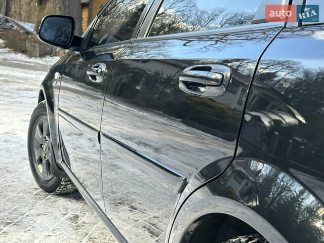 Черный Шевроле Нубира, объемом двигателя 1.6 л и пробегом 230 тыс. км за 4950 $, фото 56 на Automoto.ua