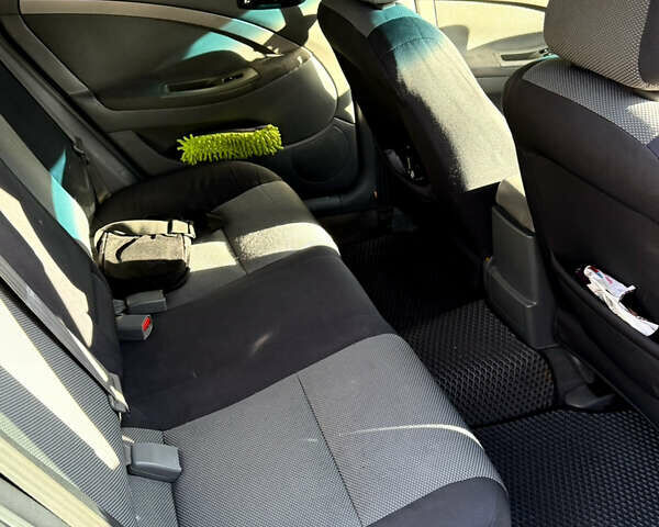 Черный Шевроле Нубира, объемом двигателя 1.6 л и пробегом 228 тыс. км за 4999 $, фото 13 на Automoto.ua