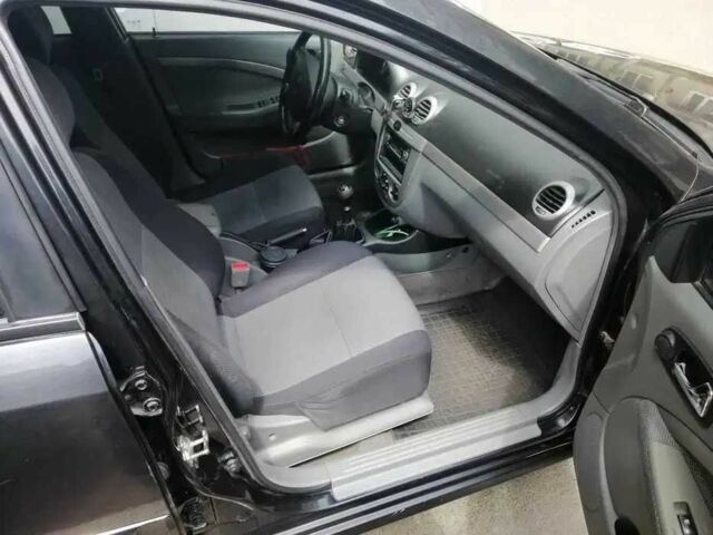 Черный Шевроле Нубира, объемом двигателя 1.6 л и пробегом 240 тыс. км за 4500 $, фото 5 на Automoto.ua