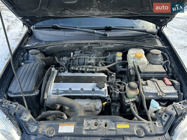 Черный Шевроле Нубира, объемом двигателя 1.6 л и пробегом 230 тыс. км за 4950 $, фото 141 на Automoto.ua