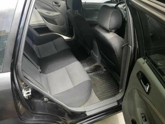 Черный Шевроле Нубира, объемом двигателя 1.6 л и пробегом 240 тыс. км за 4500 $, фото 6 на Automoto.ua