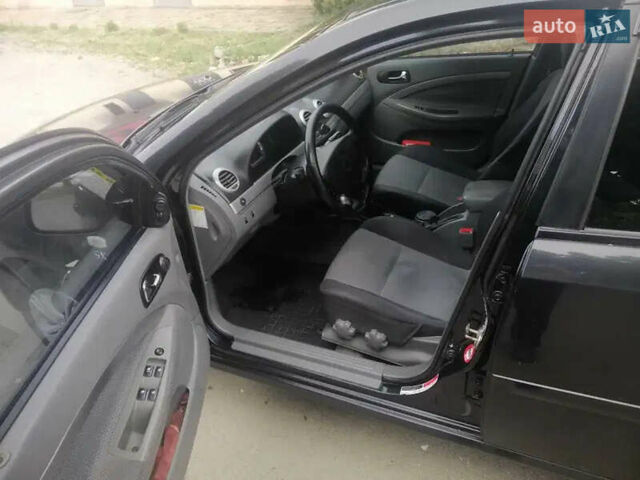 Черный Шевроле Нубира, объемом двигателя 1.6 л и пробегом 240 тыс. км за 4700 $, фото 2 на Automoto.ua