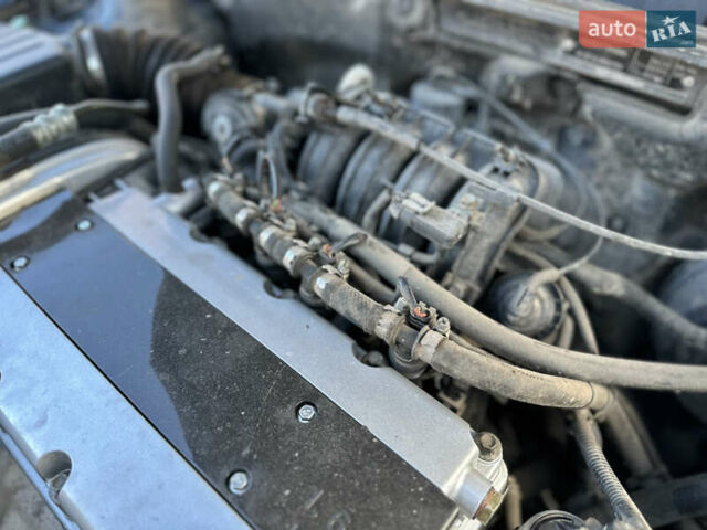 Черный Шевроле Нубира, объемом двигателя 1.6 л и пробегом 230 тыс. км за 4950 $, фото 145 на Automoto.ua