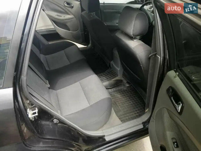 Черный Шевроле Нубира, объемом двигателя 1.6 л и пробегом 240 тыс. км за 4700 $, фото 4 на Automoto.ua