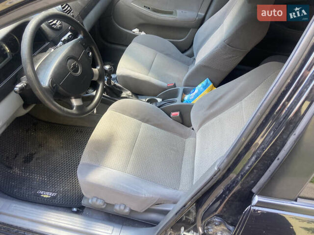 Черный Шевроле Нубира, объемом двигателя 1.6 л и пробегом 130 тыс. км за 5500 $, фото 6 на Automoto.ua