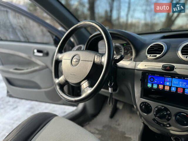 Черный Шевроле Нубира, объемом двигателя 1.6 л и пробегом 230 тыс. км за 4950 $, фото 88 на Automoto.ua