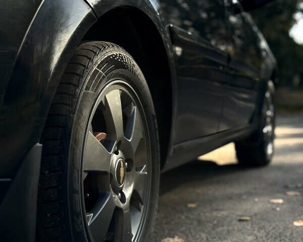 Черный Шевроле Нубира, объемом двигателя 1.6 л и пробегом 228 тыс. км за 4999 $, фото 1 на Automoto.ua