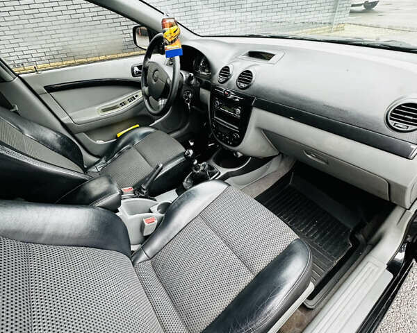 Черный Шевроле Нубира, объемом двигателя 1.6 л и пробегом 252 тыс. км за 4500 $, фото 24 на Automoto.ua