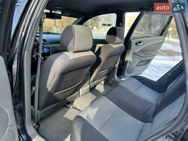 Черный Шевроле Нубира, объемом двигателя 1.6 л и пробегом 230 тыс. км за 4950 $, фото 123 на Automoto.ua