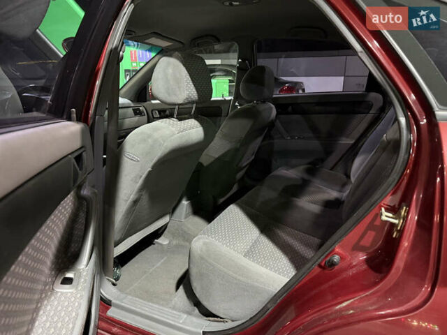 Красный Шевроле Нубира, объемом двигателя 1.8 л и пробегом 115 тыс. км за 3450 $, фото 18 на Automoto.ua