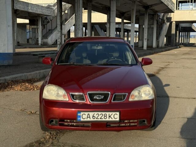 Красный Шевроле Нубира, объемом двигателя 1.8 л и пробегом 231 тыс. км за 3500 $, фото 1 на Automoto.ua