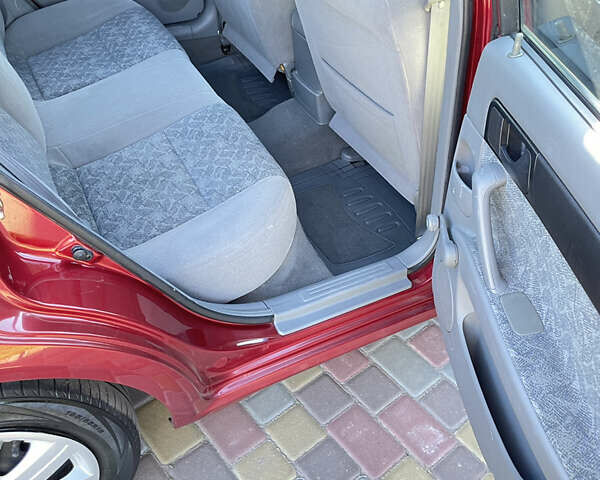 Красный Шевроле Нубира, объемом двигателя 1.8 л и пробегом 78 тыс. км за 4450 $, фото 13 на Automoto.ua