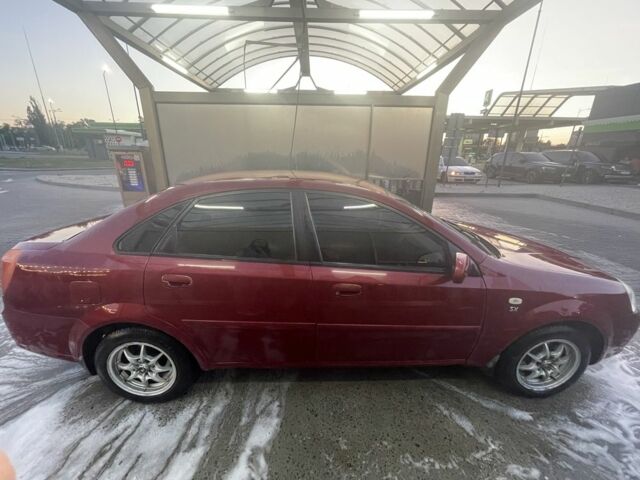 Красный Шевроле Нубира, объемом двигателя 1.8 л и пробегом 250 тыс. км за 3099 $, фото 1 на Automoto.ua