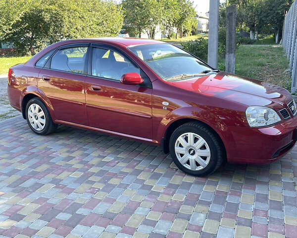 Красный Шевроле Нубира, объемом двигателя 1.8 л и пробегом 78 тыс. км за 4450 $, фото 6 на Automoto.ua