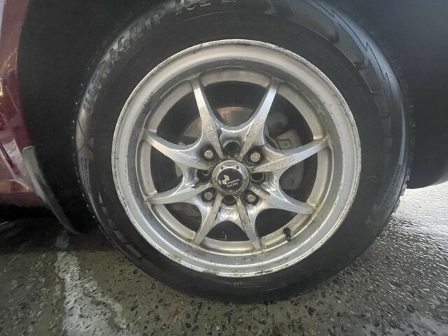 Красный Шевроле Нубира, объемом двигателя 1.8 л и пробегом 250 тыс. км за 3099 $, фото 4 на Automoto.ua