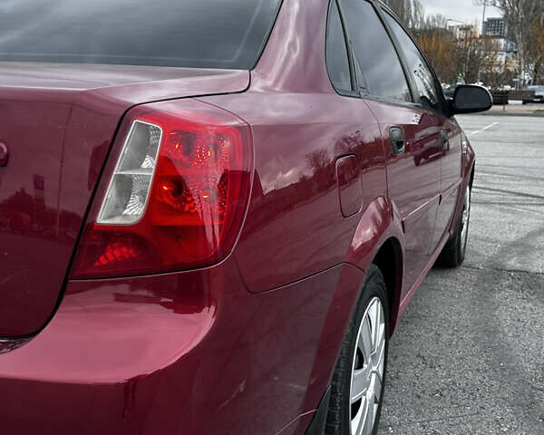 Красный Шевроле Нубира, объемом двигателя 1.6 л и пробегом 222 тыс. км за 3999 $, фото 6 на Automoto.ua