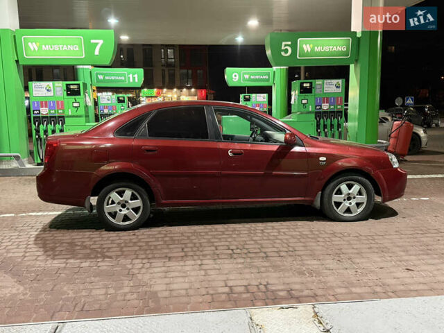 Красный Шевроле Нубира, объемом двигателя 1.8 л и пробегом 115 тыс. км за 3450 $, фото 7 на Automoto.ua