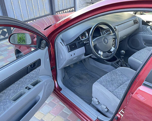 Красный Шевроле Нубира, объемом двигателя 1.8 л и пробегом 78 тыс. км за 4450 $, фото 7 на Automoto.ua