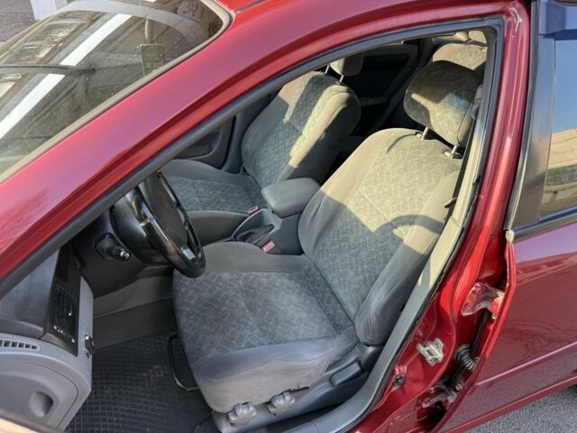 Красный Шевроле Нубира, объемом двигателя 1.8 л и пробегом 231 тыс. км за 3500 $, фото 12 на Automoto.ua