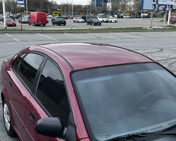 Красный Шевроле Нубира, объемом двигателя 1.6 л и пробегом 222 тыс. км за 3999 $, фото 10 на Automoto.ua