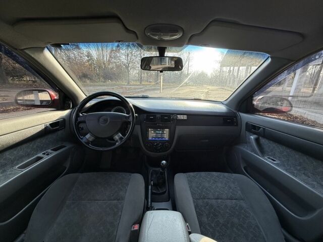 Красный Шевроле Нубира, объемом двигателя 1.8 л и пробегом 231 тыс. км за 3500 $, фото 19 на Automoto.ua