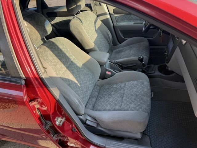 Красный Шевроле Нубира, объемом двигателя 1.8 л и пробегом 231 тыс. км за 3500 $, фото 17 на Automoto.ua