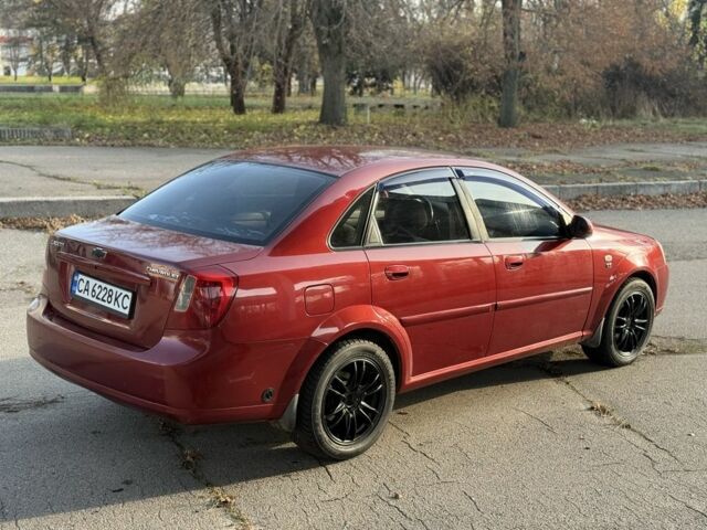 Красный Шевроле Нубира, объемом двигателя 1.8 л и пробегом 231 тыс. км за 3500 $, фото 3 на Automoto.ua