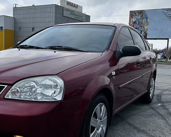 Красный Шевроле Нубира, объемом двигателя 1.6 л и пробегом 222 тыс. км за 3999 $, фото 8 на Automoto.ua