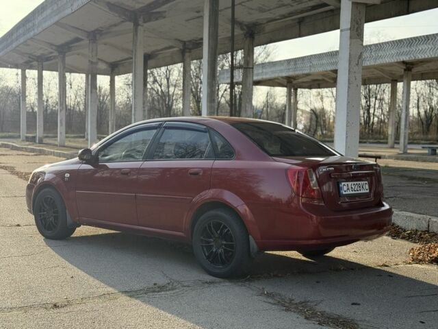 Красный Шевроле Нубира, объемом двигателя 1.8 л и пробегом 231 тыс. км за 3500 $, фото 6 на Automoto.ua