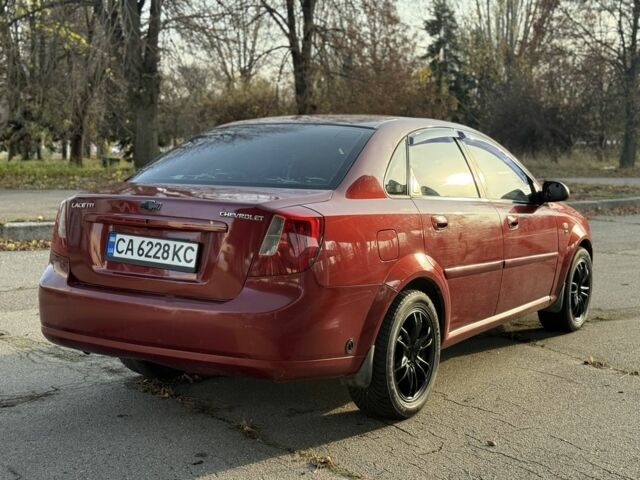Красный Шевроле Нубира, объемом двигателя 1.8 л и пробегом 231 тыс. км за 3500 $, фото 4 на Automoto.ua