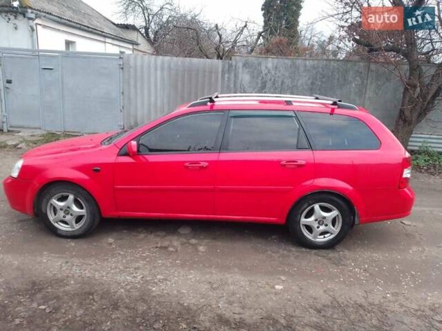 Красный Шевроле Нубира, объемом двигателя 1.8 л и пробегом 200 тыс. км за 3500 $, фото 4 на Automoto.ua