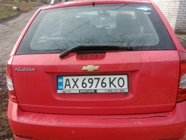 Красный Шевроле Нубира, объемом двигателя 1.8 л и пробегом 206 тыс. км за 3000 $, фото 2 на Automoto.ua