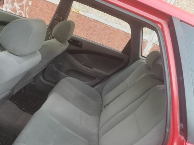 Красный Шевроле Нубира, объемом двигателя 0 л и пробегом 28 тыс. км за 3700 $, фото 8 на Automoto.ua