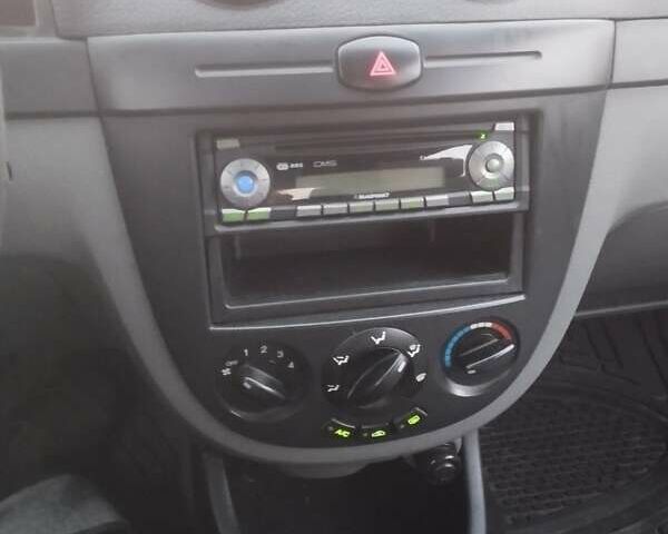 Червоний Шевроле Нубіра, об'ємом двигуна 1.6 л та пробігом 232 тис. км за 3800 $, фото 9 на Automoto.ua