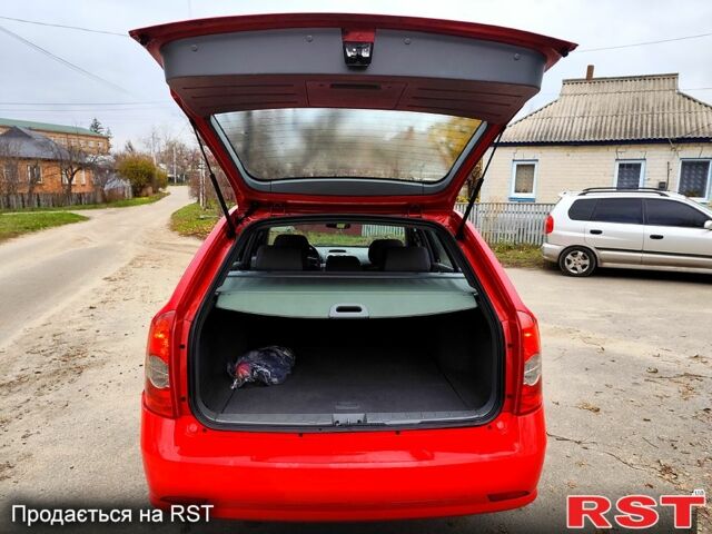 Красный Шевроле Нубира, объемом двигателя 2 л и пробегом 278 тыс. км за 4799 $, фото 6 на Automoto.ua